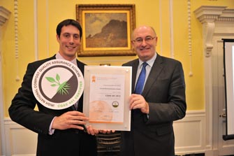 Kevin McCabe, Facility Operations Manager,is presented an award from Minister Phil Hogan. Enrich becomes one of the first composting facility to be awarded with the new compost quality standard.